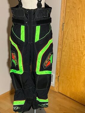 FXR Men’s Black Snowmobile Bib Pants with Neon Green Accents